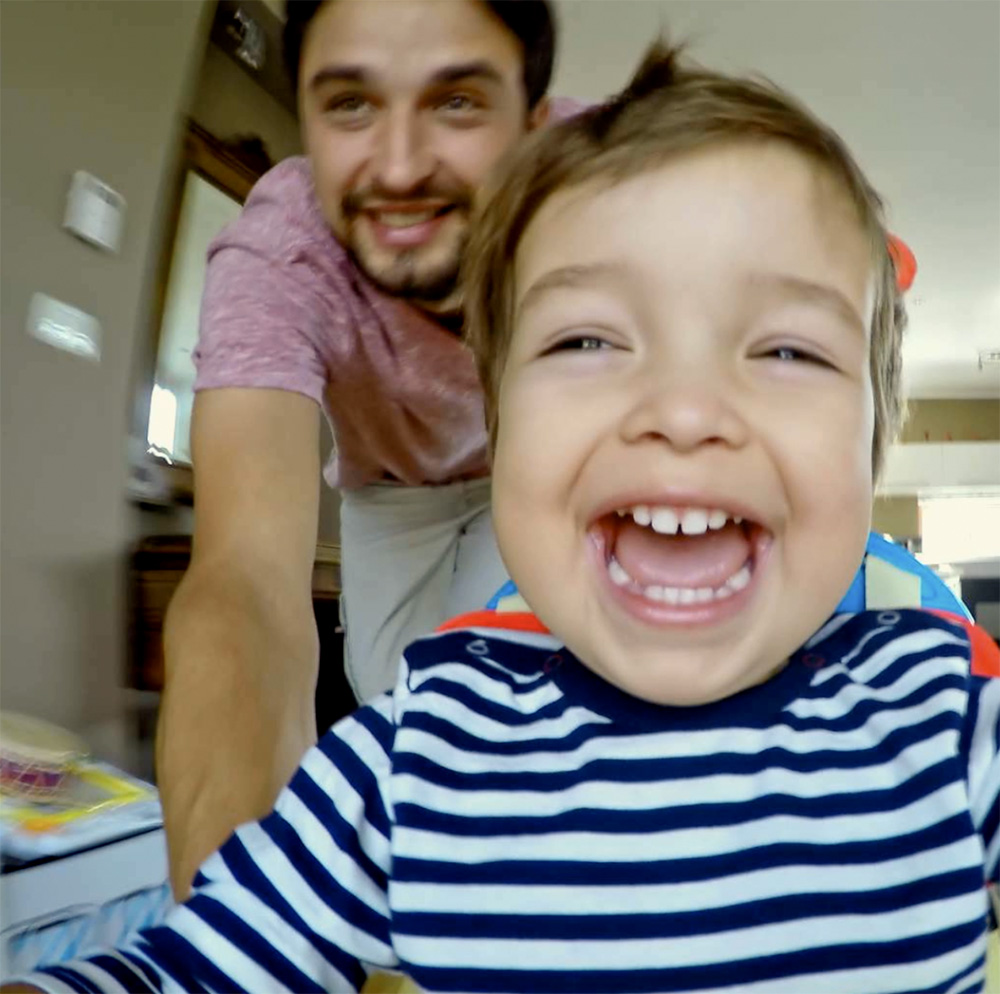 Young Child Being Pushed in Toy by Father GET500 Video