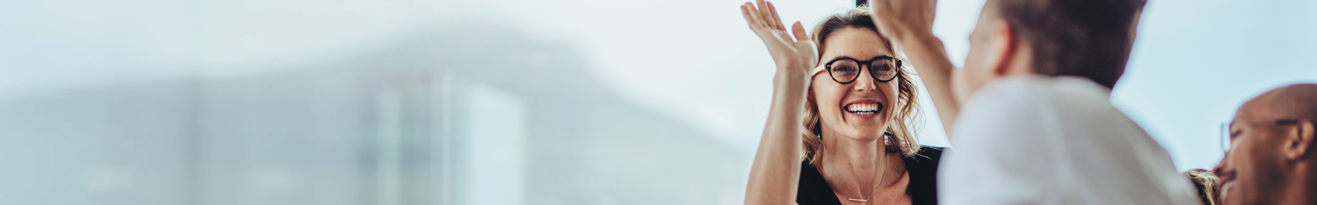 Group of office workers high fiving